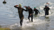 First athlets living the water at Bergsee Ratscher Quadrathlon (GER) 2021 (c) L. Rohde